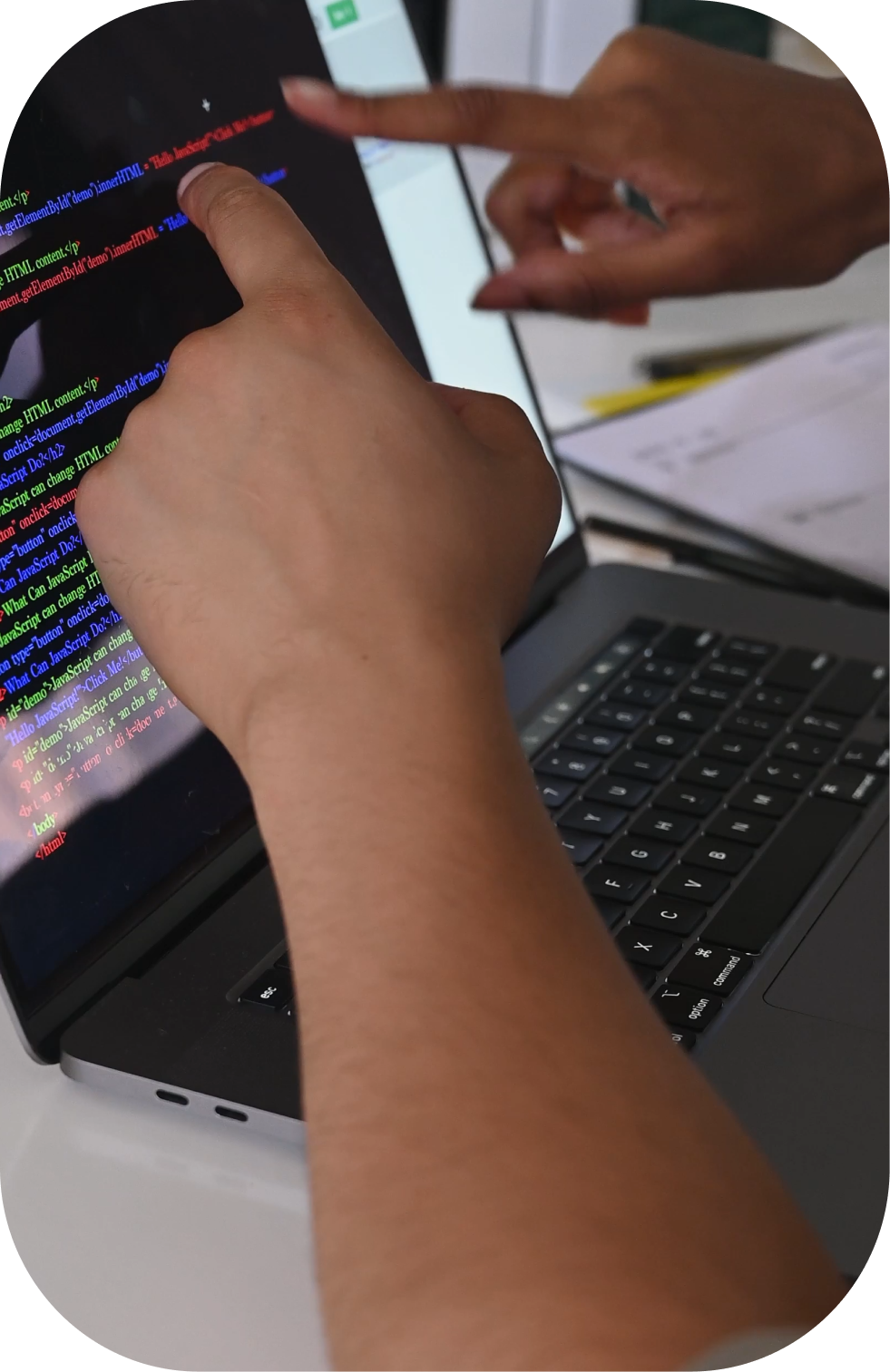 Reviewing code on a laptop